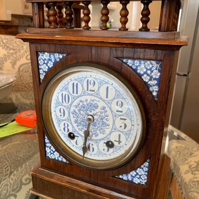 Winterhalder and Hofmeier Black Forest German Blue and Whit Porcelain Walnut Mantel Clock Circa 1900 Clock measure 12.5 by 8.5 by 5.5 inches