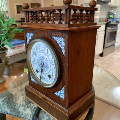 Winterhalder and Hofmeier Black Forest German Blue and Whit Porcelain Walnut Mantel Clock Circa 1900 Clock measure 12.5 by 8.5 by 5.5 inches