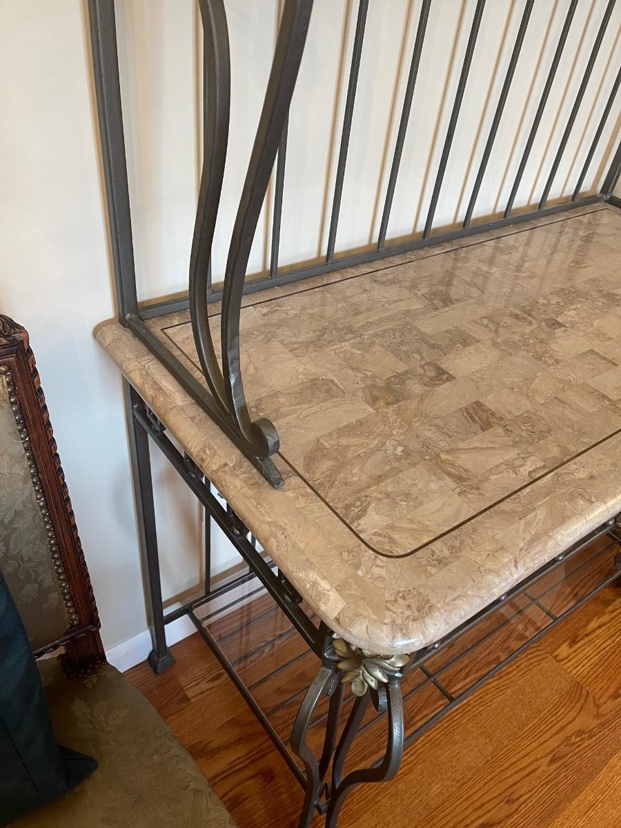 Wrought iron bakers rack with glass shelves. 84” tall, 40” wide, 20