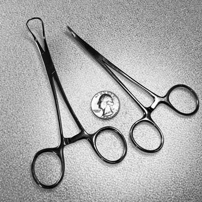 STAINLESS SURGICAL CLAMPS X 2