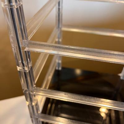 REVOLVING LUCITE, PLASTIC JEWELRY RACK