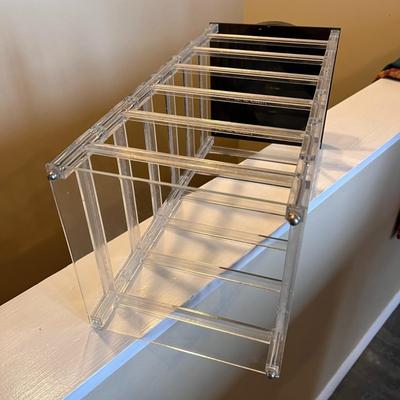 REVOLVING LUCITE, PLASTIC JEWELRY RACK