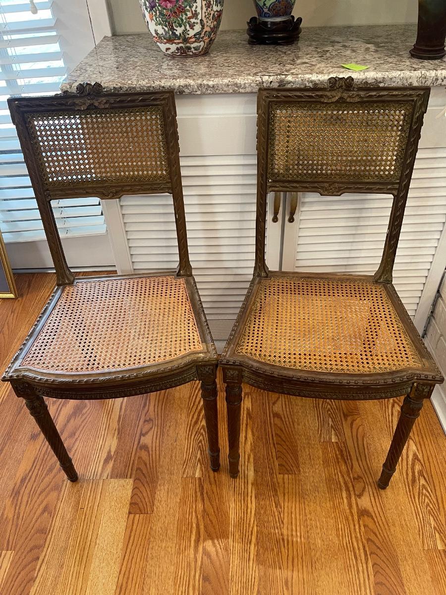 Two antique cane back and cane seat chairs