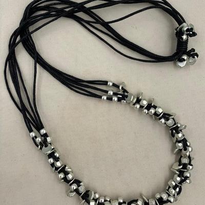 Necklace with silver colored beads