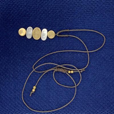 Gold and silver colored pendant