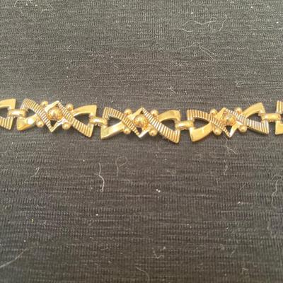 Vtg Bow tie bracelet  (7.5â€ ) with screw back earrings.