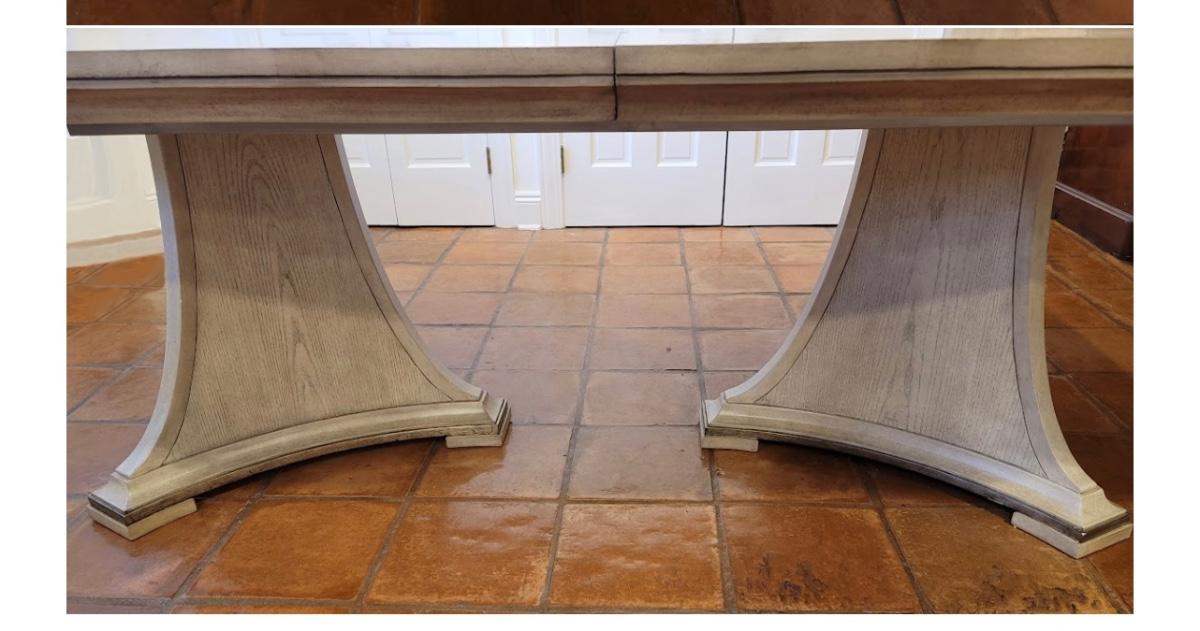 Marge Carson dining table is 96W x 48D x 30H and has a 24" leaf