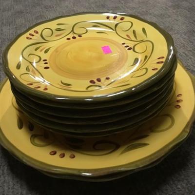 collection of earthenware hand painted plates