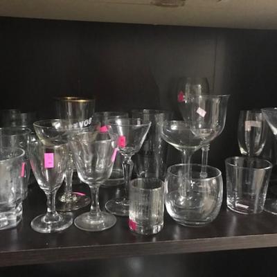 lot of stemware and glasses