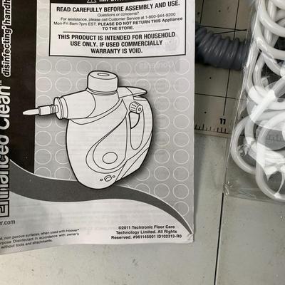 #27 Hoover Handheld Disinfecting Device and Cleaners