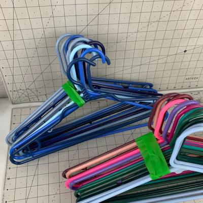 #358 Two Bundles of Colorful Hangers