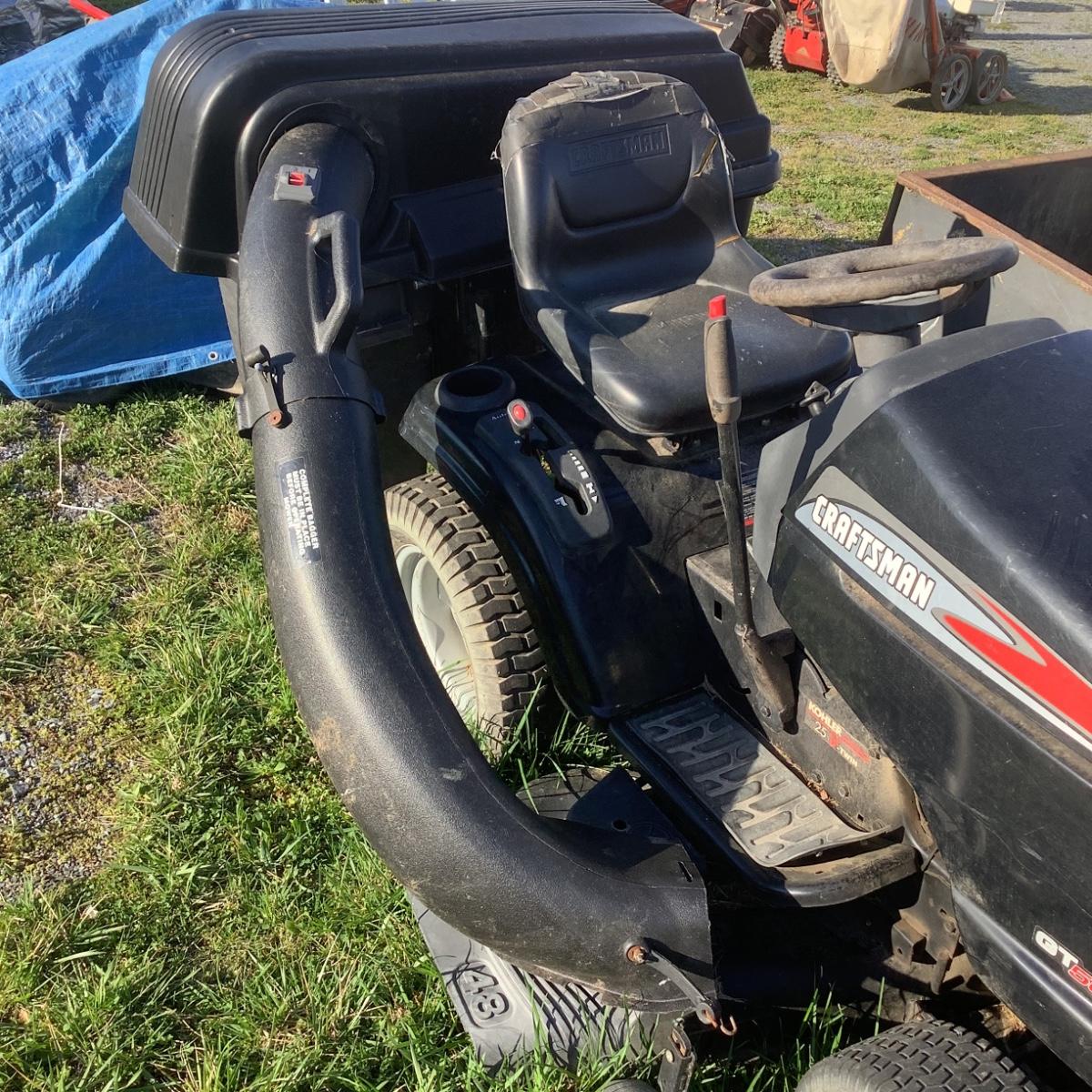 143 Craftsman GT5000 48 Deck Kohler 25HP Lawn Mower with Riding Mower Baggage Attachments EstateSales