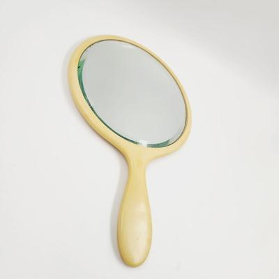 VINTAGE BAKELITE VANITY MIRROR
