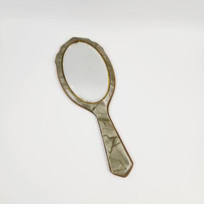 VINTAGE HAND HELD GRAYISH VANITY MIRROR