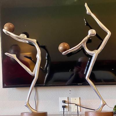 Set of two gymnast sculptures