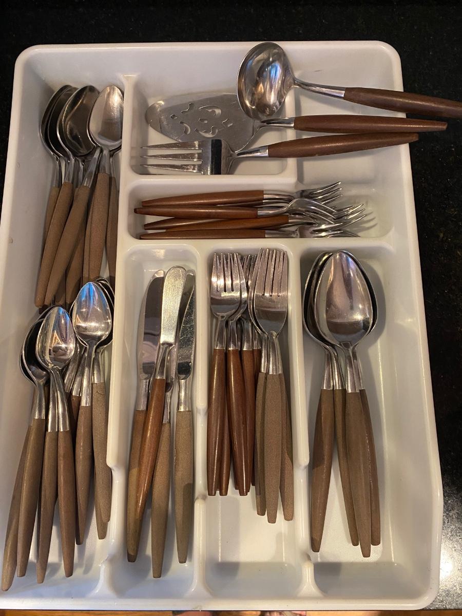 49piece set of MCM flatware with wooden handles