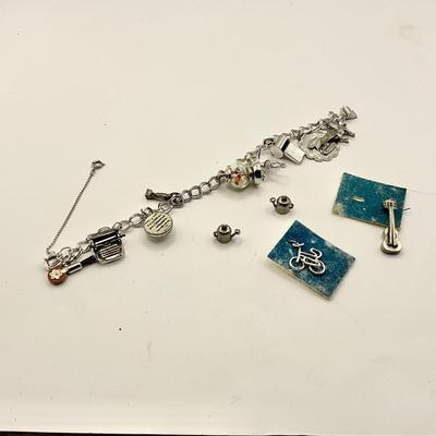 1574 Sterling Silver Charm Bracelet with extra Charms