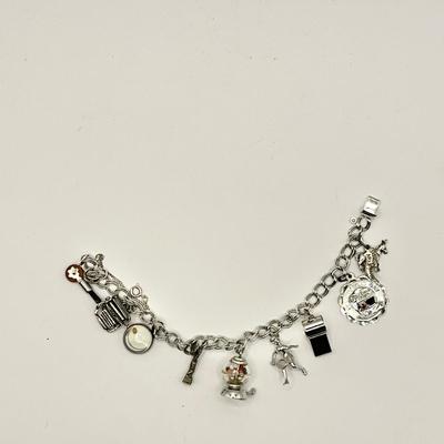 1574 Sterling Silver Charm Bracelet with extra Charms