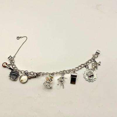 1574 Sterling Silver Charm Bracelet with extra Charms