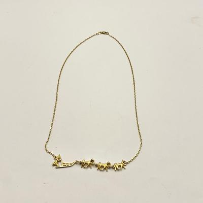 1579 14k Yellow Gold Dog Sledding Musher Necklace
