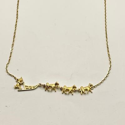1579 14k Yellow Gold Dog Sledding Musher Necklace