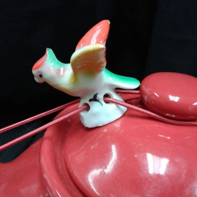 Red Teapot with porcelain bird lid holder