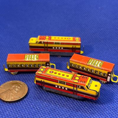 TINY TIN TOY TRAIN CARS x 4