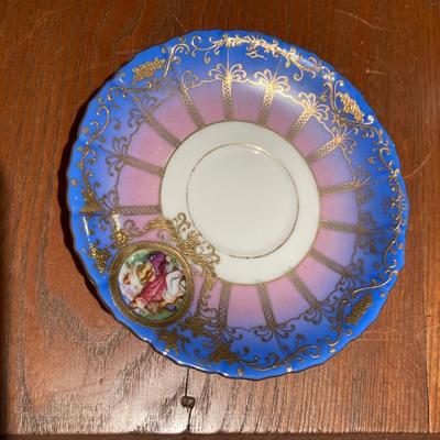 Vintage made in occupied Japan demitasse teacups with saucers and little boy