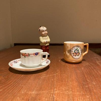 Vintage made in occupied Japan demitasse teacups with saucers and little boy
