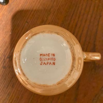 Vintage made in occupied Japan demitasse teacups with saucers and little boy