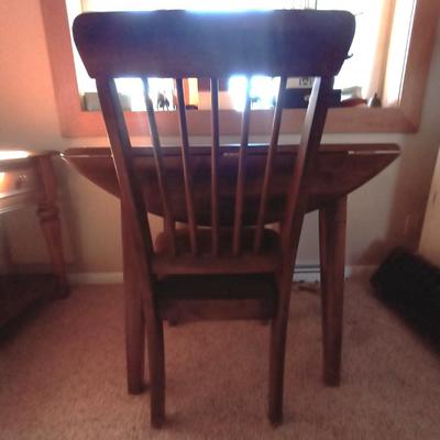WOODEN DROP LEAF DINING TABLE AND TWO CHAIRS