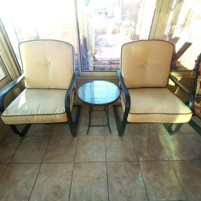 TWO CUSIONED PATIO CHAIRS AND SMALL TABLE