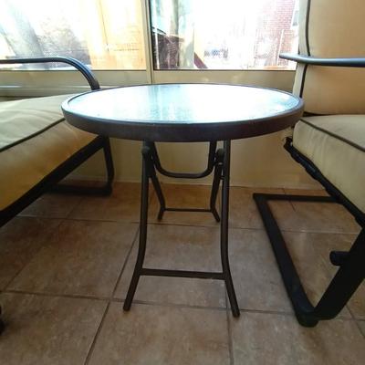 TWO CUSIONED PATIO CHAIRS AND SMALL TABLE
