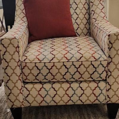 Patterened chair matching sofa