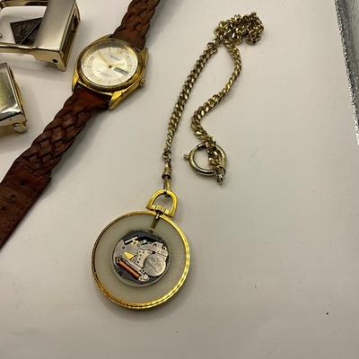 1694 Men's Jewelry Lot - Belt Buckle, Sterling Cuff Links, and Watch