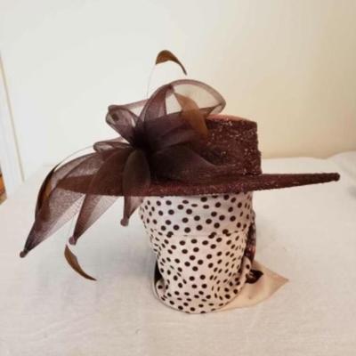 Women's brown felt wide brim hat with brown lace overlay, feathers & a brown net bow