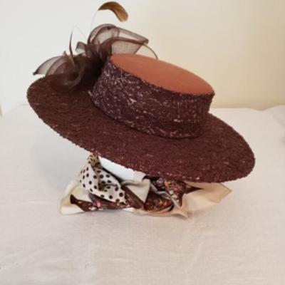 Women's brown felt wide brim hat with brown lace overlay, feathers & a brown net bow