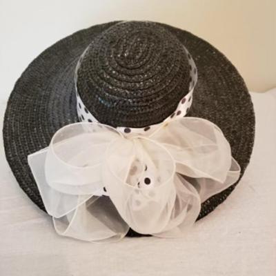 Women's black straw wide brim hat with polka dot ribbon & white organza bow