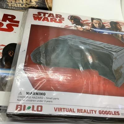 Star Wars new unopened Cosmic shells about 37, collectorsâ€™ album, virtual reality goggles - also unopened Star Wars Trilogy Special...