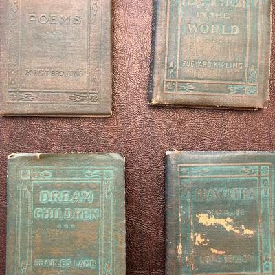 23 Volumes of the Little Leather Library.