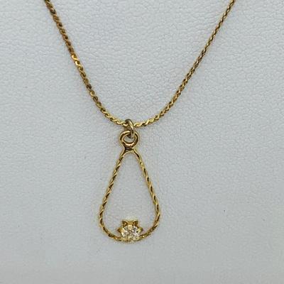 LOT 295: Oval Pendant with 1/20ct Diamond on 14K Chain