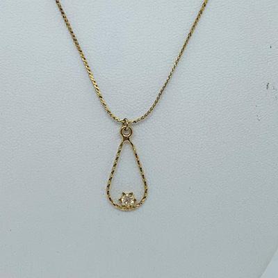 LOT 295: Oval Pendant with 1/20ct Diamond on 14K Chain