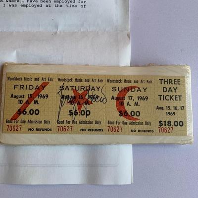 Woodstock ticket with certificate of authenticity & The Story of Woodstock 50 years book