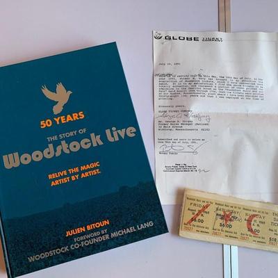 Woodstock ticket with certificate of authenticity & The Story of Woodstock 50 years book