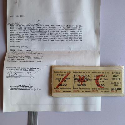 Woodstock ticket with certificate of authenticity & The Story of Woodstock 50 years book