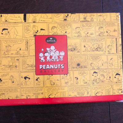 M. J. Hummel doll and Hallmark Peanuts Collection.