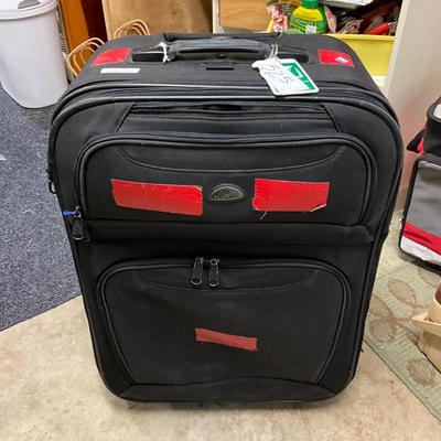 1737 Large Black Samsonite Rolling Luggage