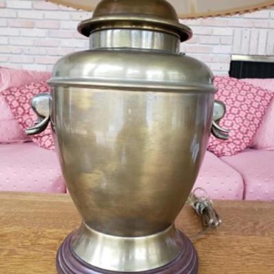 Vintage brass urn style lamp with elephant handles and wooden base