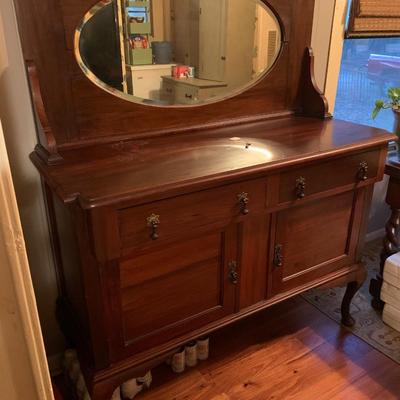 Mahogany buffet, beveled mirror, 2 drawers, 2 doors, 2 shelves, key 60â€H 48â€W 20â€depth