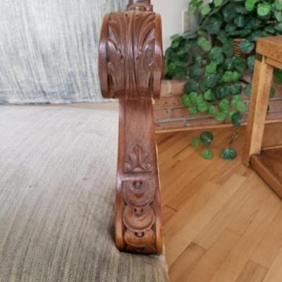 Antique Walnut carved fireside arm chair. Circa 1850.